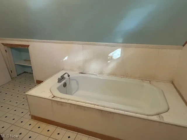 Bathroom featuring a bath