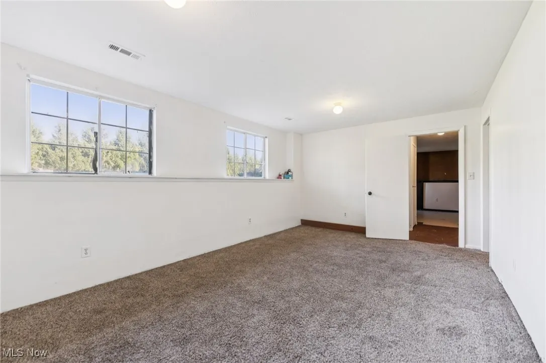 View of carpeted spare room