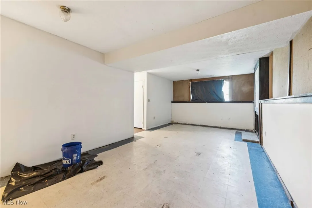 Unfurnished room with tile patterned floors