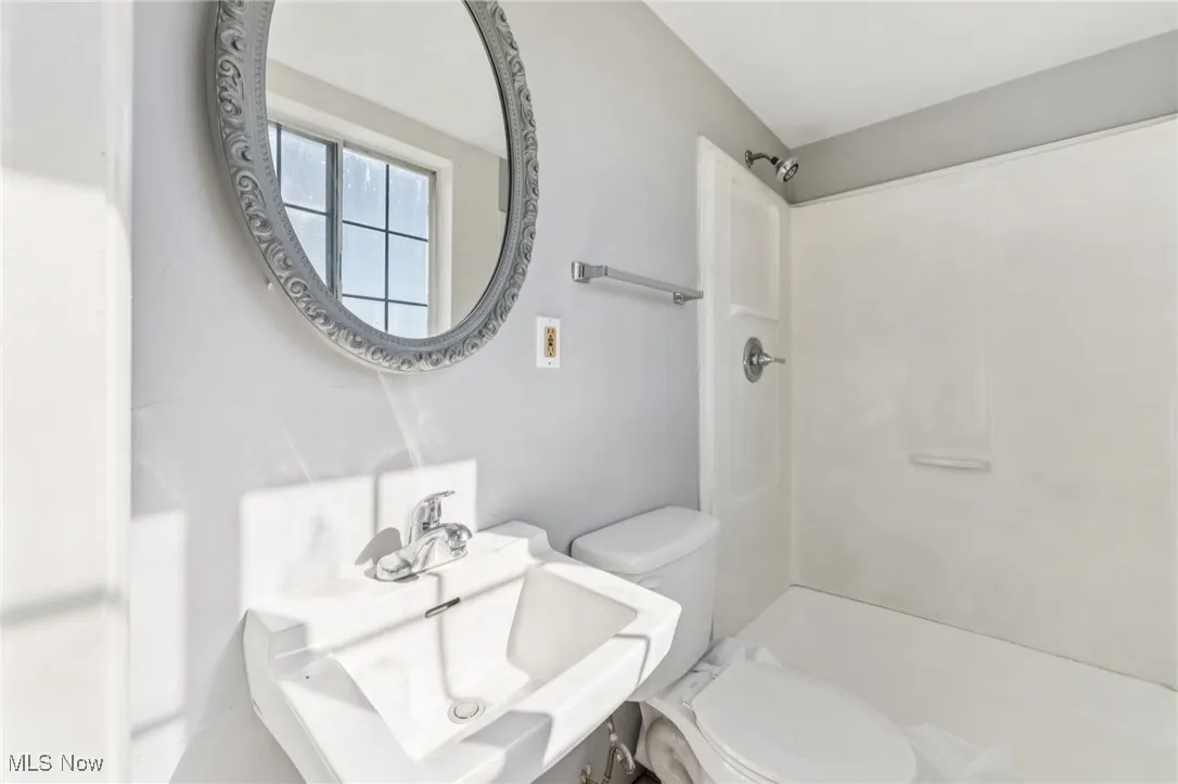 Full bathroom with a shower