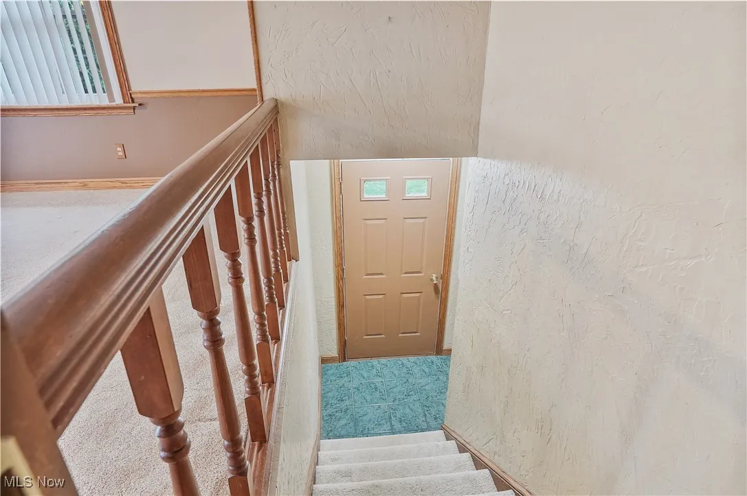 Staircase with a textured wall