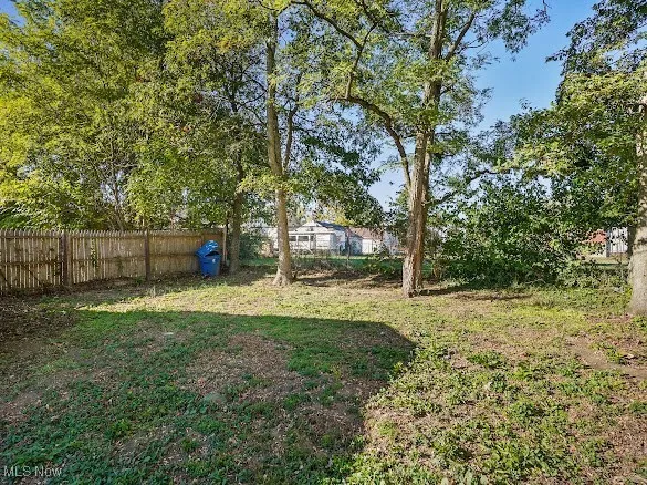 View of fenced backyard