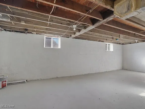 Below grade area featuring plenty of natural light