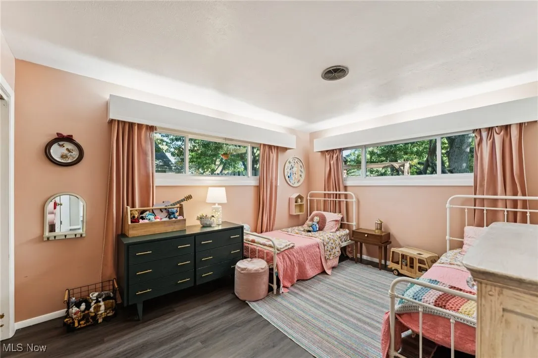 Bedroom featuring dark wood finished floors