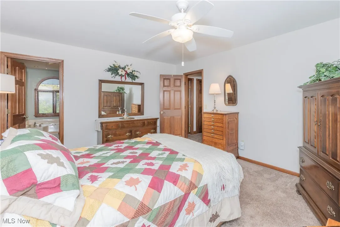 Spacious primary bedroom with private bath, walk in closet and second bonus room.