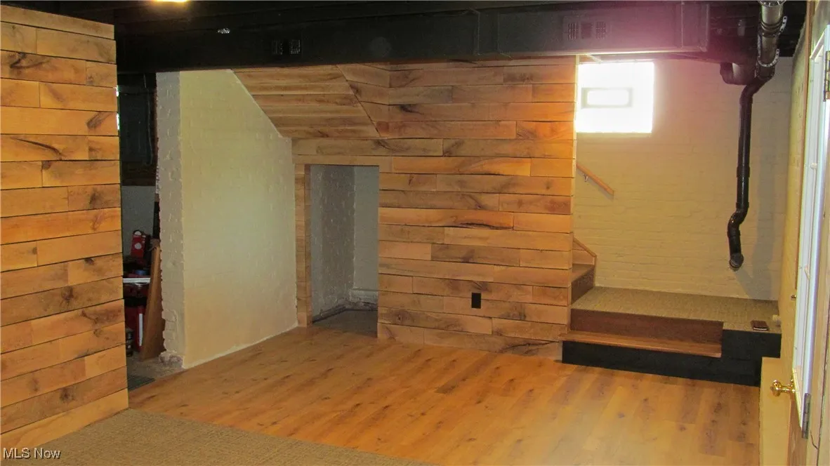 Rec Room to Main Floor. Furnace, Hot Water Tank in Rear.