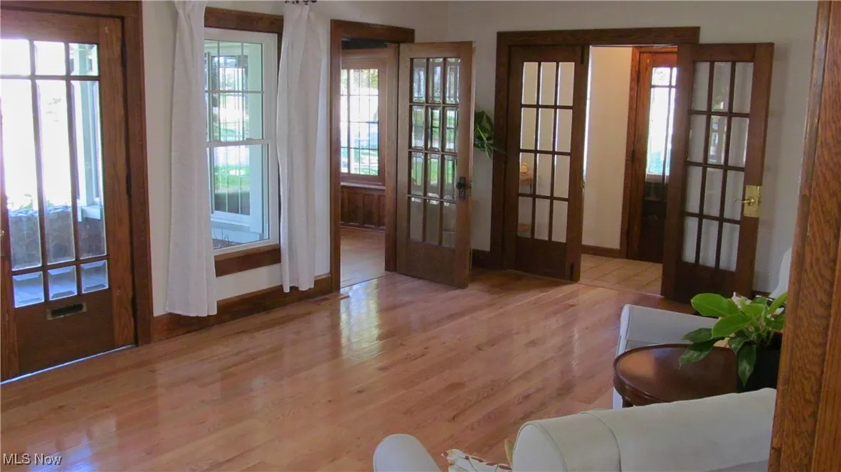 Living Room to Front Porch and Sun Room