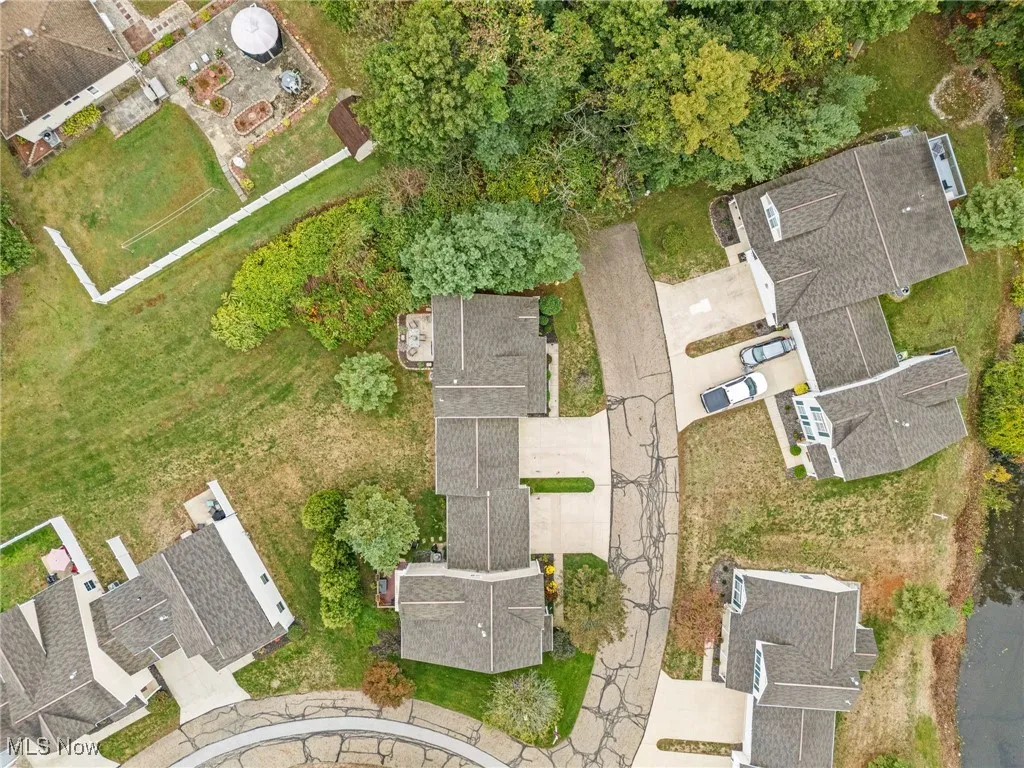 Aerial overview of property's location with nearby suburban area