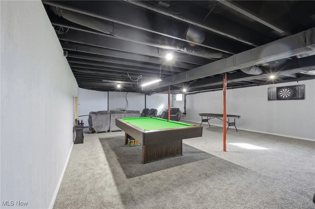 Recreation room featuring pool table and light carpet