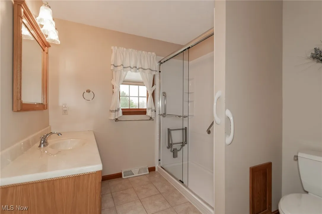 Clean, Bright Bathrooms – Neutral finishes and move-in ready condition.