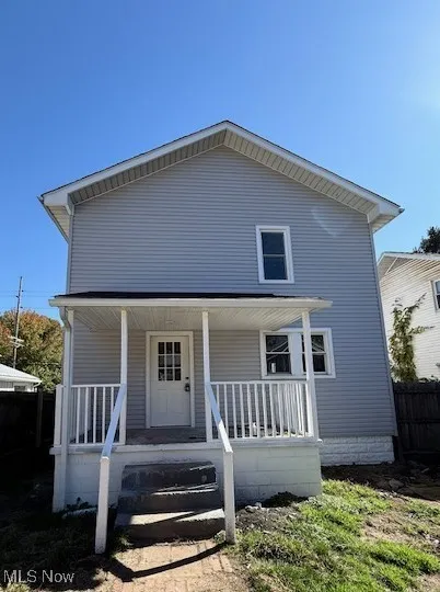 View of front of house featuring covered porch