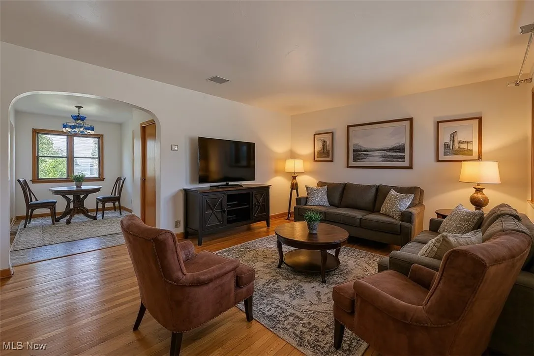 Virtually Staged view of living room and eat in dining area