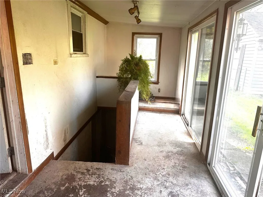 Hallway with an upstairs landing