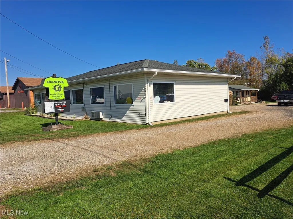 Front of building with driveway