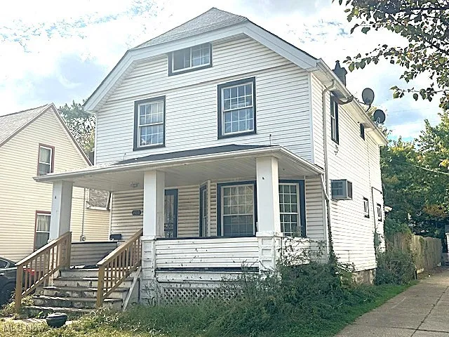 View of front of property featuring covered porch
