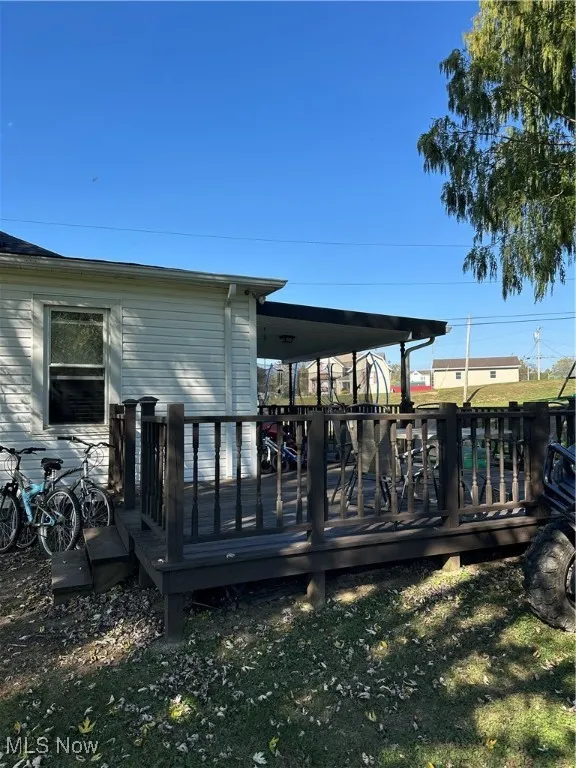  rear View of property and wooden deck