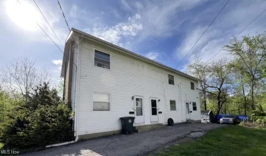 Rear view of house with a patio area