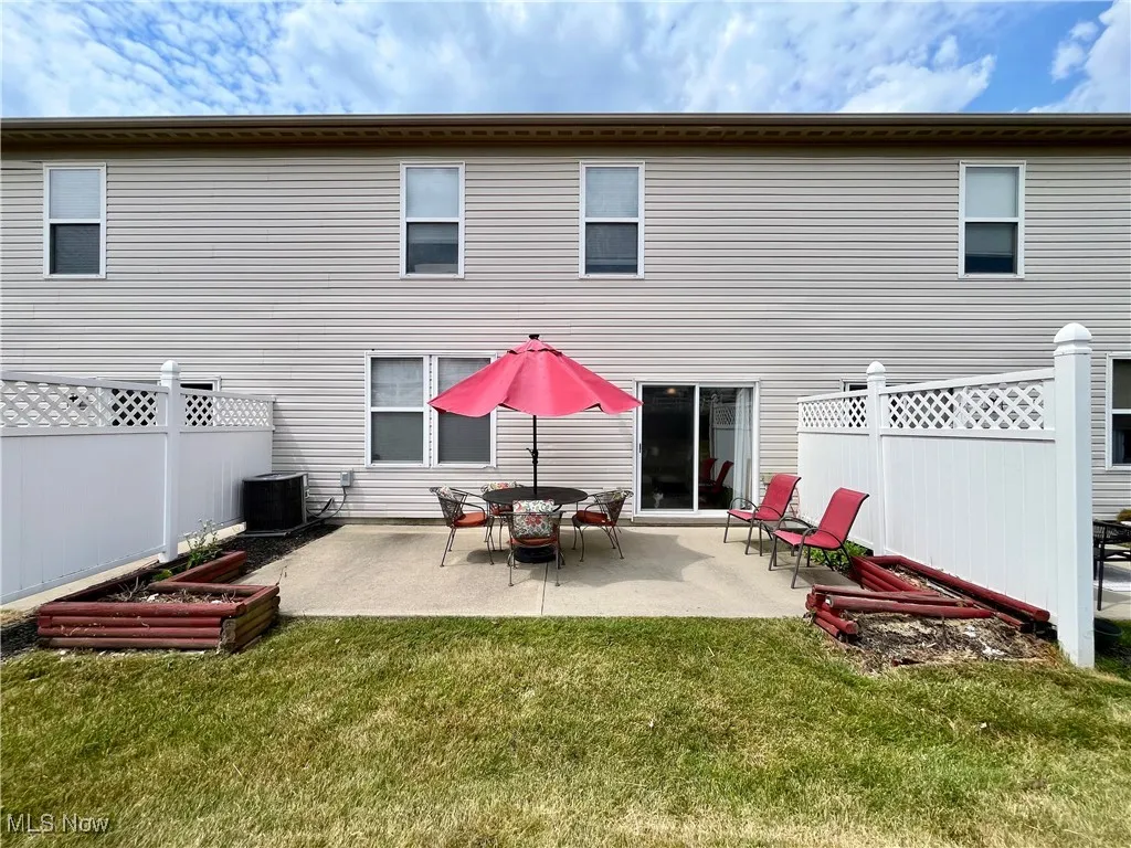 Back of property featuring a patio