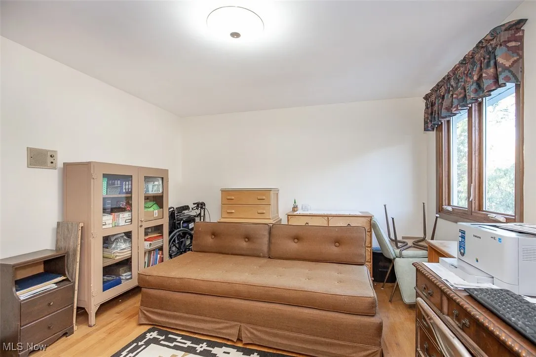 Sitting room featuring light wood-type flooring