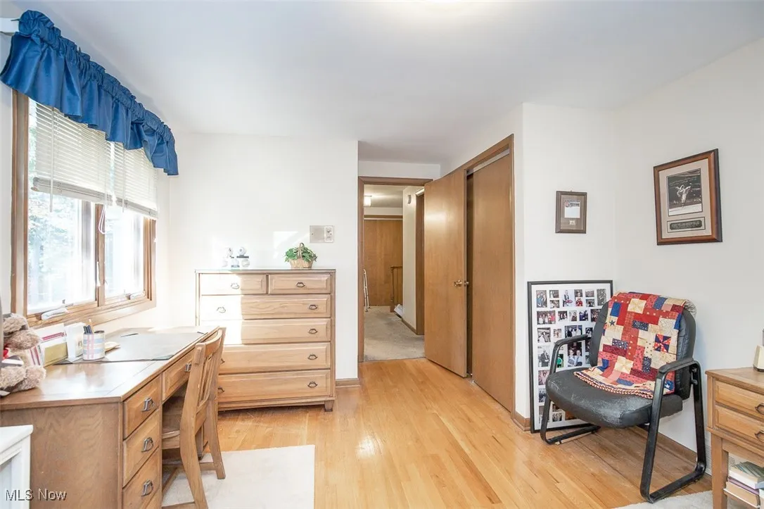 Office area featuring light wood finished floors and baseboards