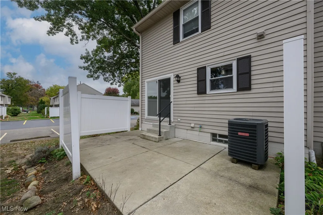Back of property featuring a patio area and entry steps