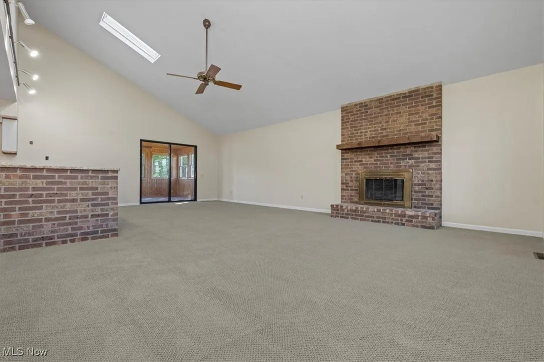 Fireplace and 4 Season Room
 access in Living Room/Dining Room
