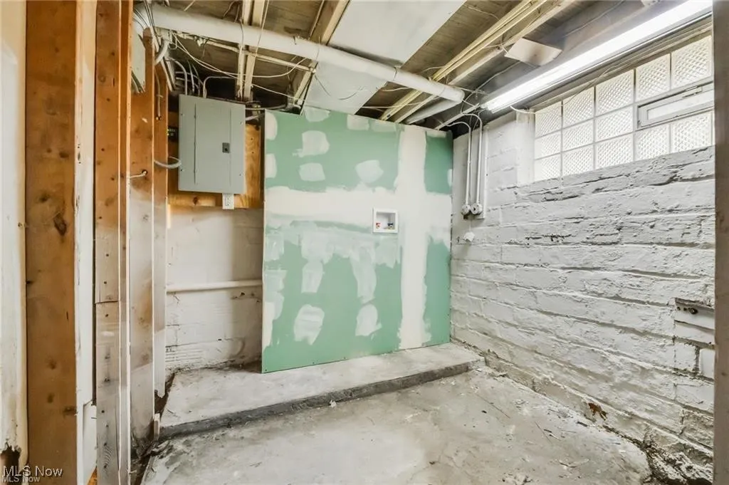 Below grade area featuring electric panel