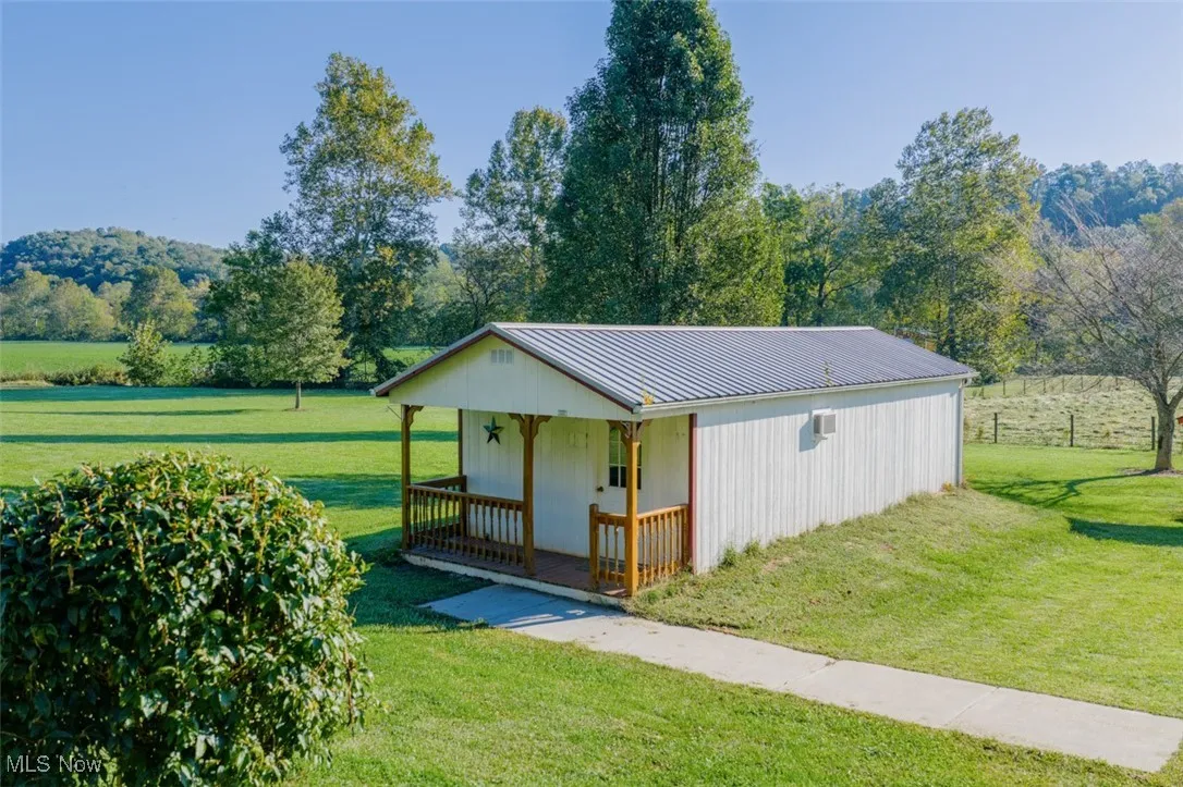 View of outbuilding with a mountain view
