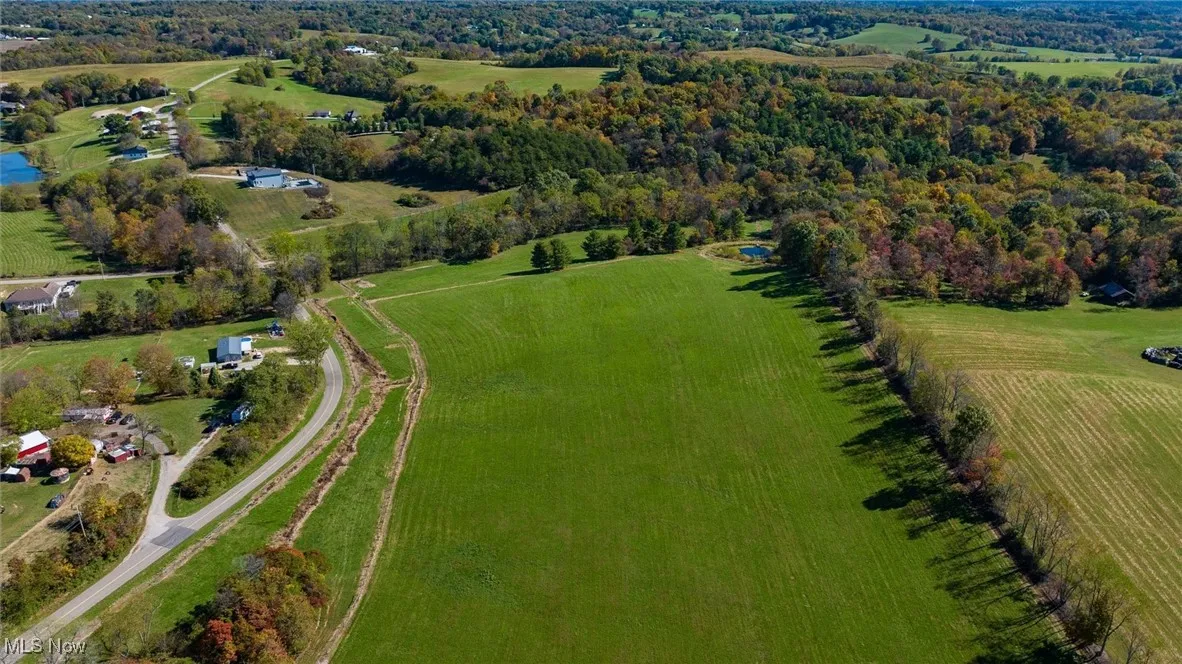 Aerial view of property's location with rural landscape