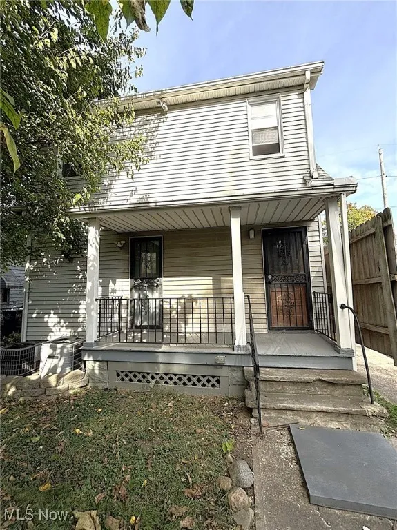 View of front of property with covered porch