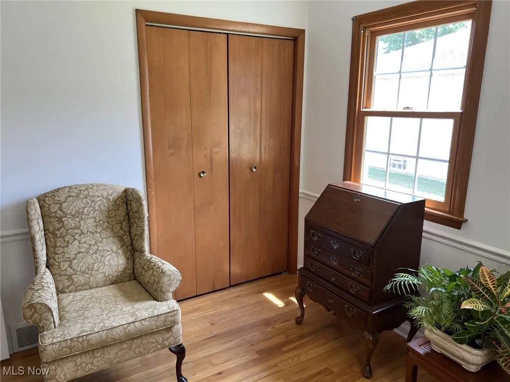 Sitting room with wood finished floors