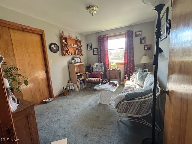 Bedroom area featuring carpet floors currently uses the sitting room