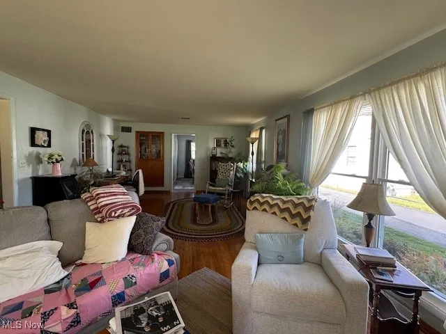 Living area with wood finished floors