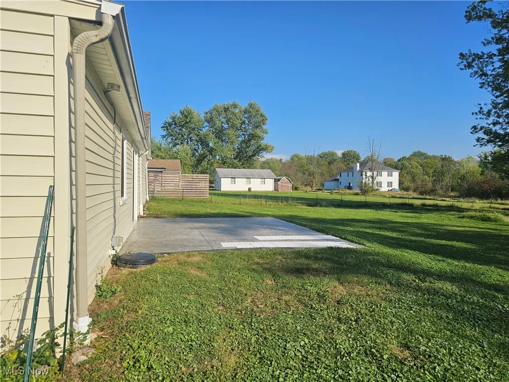 View of fenced backyard