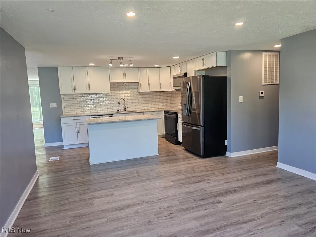 Use this front window area for your dining or an open family room