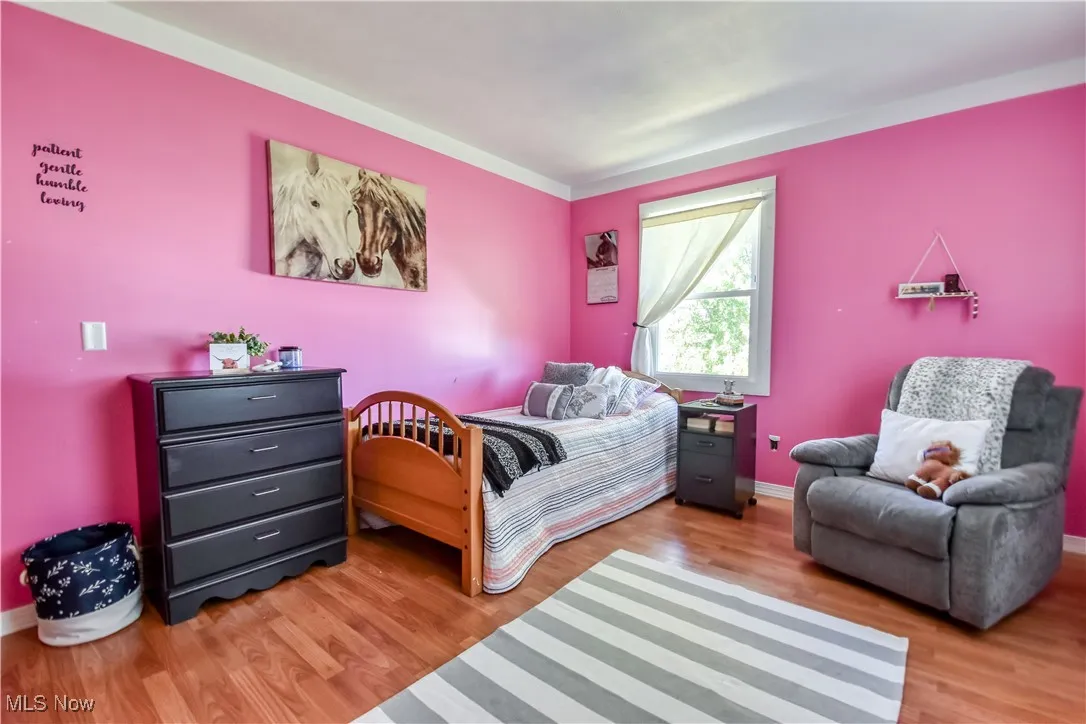 Bedroom with light wood-type flooring