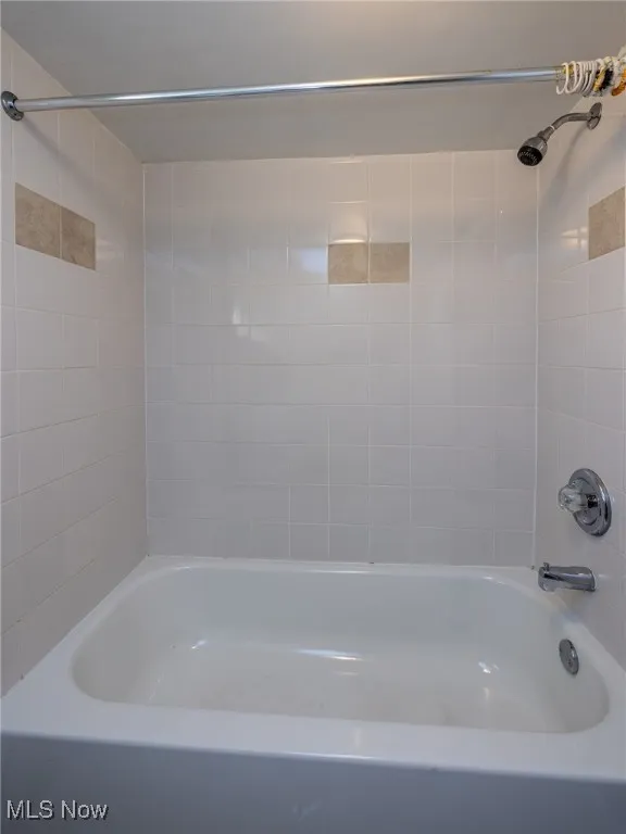 Full bath featuring  shower combination