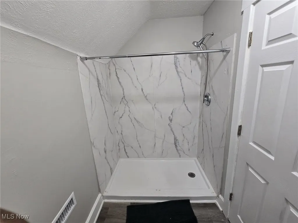 Full bath on second floor,  shower area
