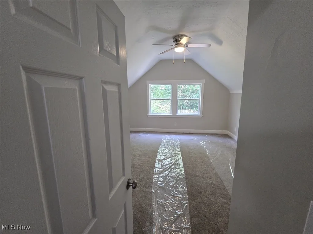 Second Floor Bedroom 2, with view of the backyard