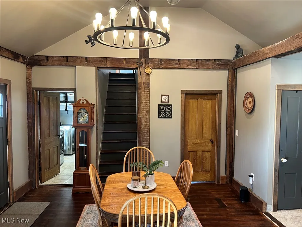 Dining room with vaulted ceiling