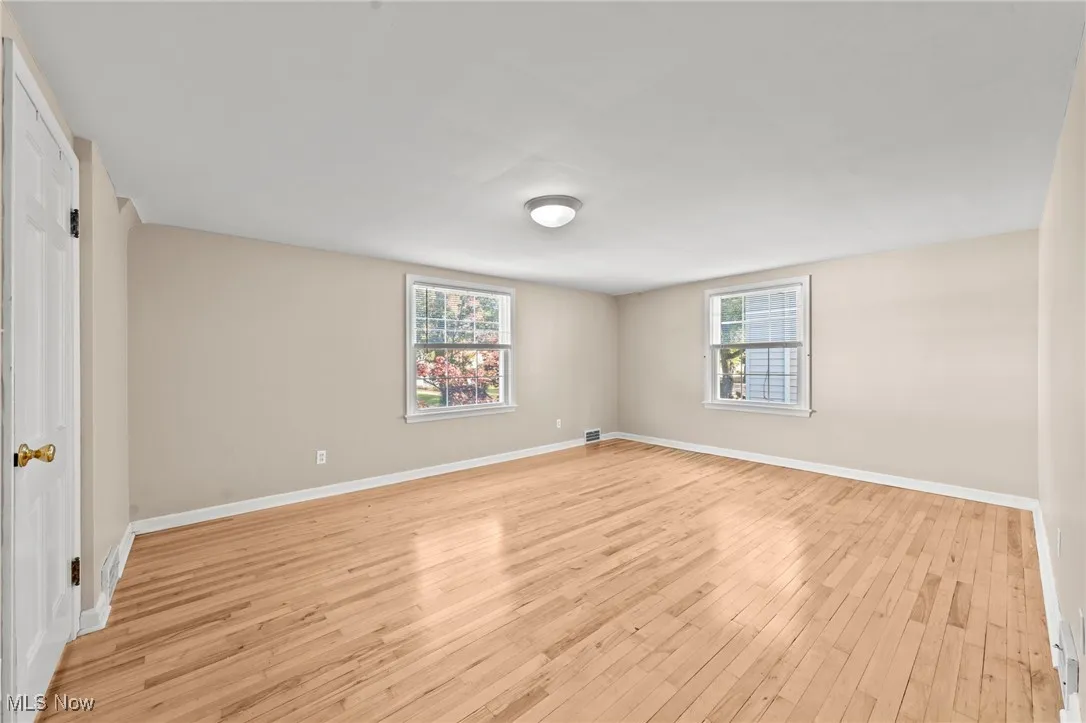 Spare room featuring light wood finished floors