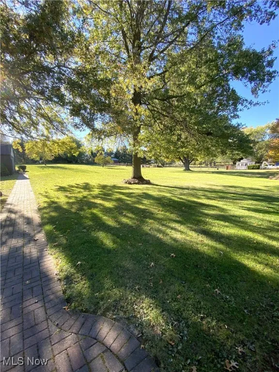 Brick sidewalk to detached garage
