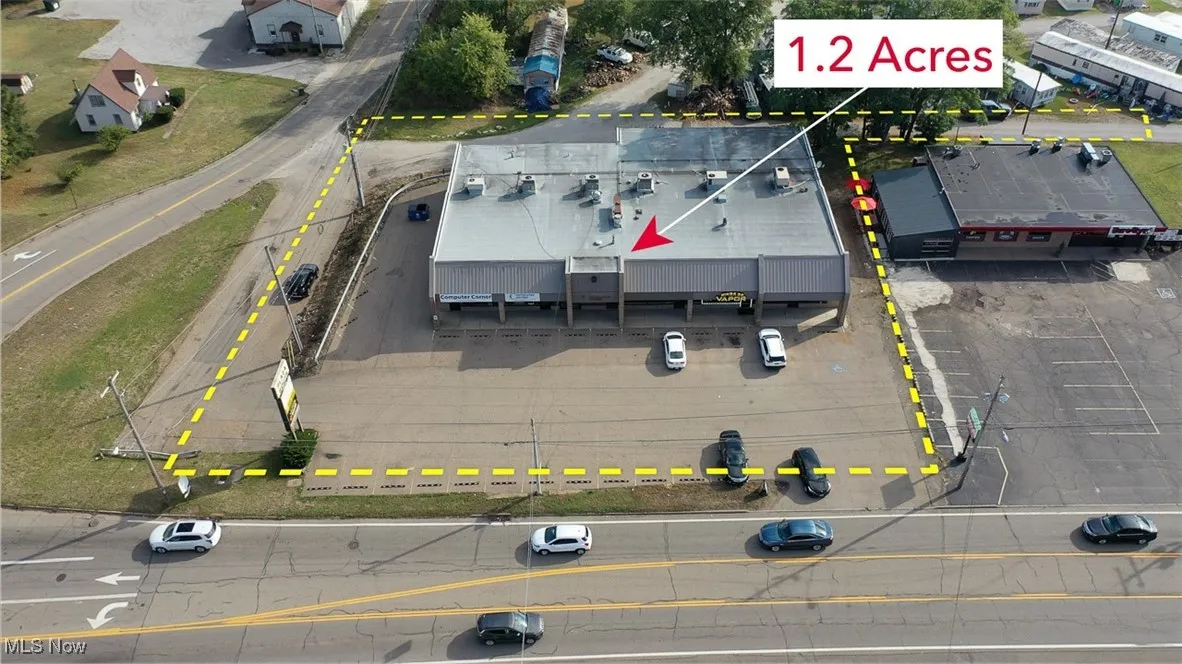 Aerial overview of property's location featuring property boundaries highlighted