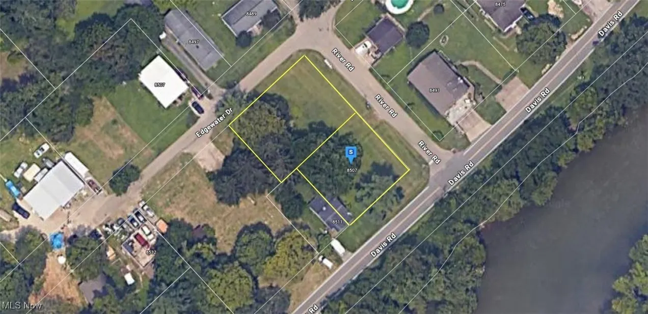 Aerial overview of property's location featuring property parcel outlined