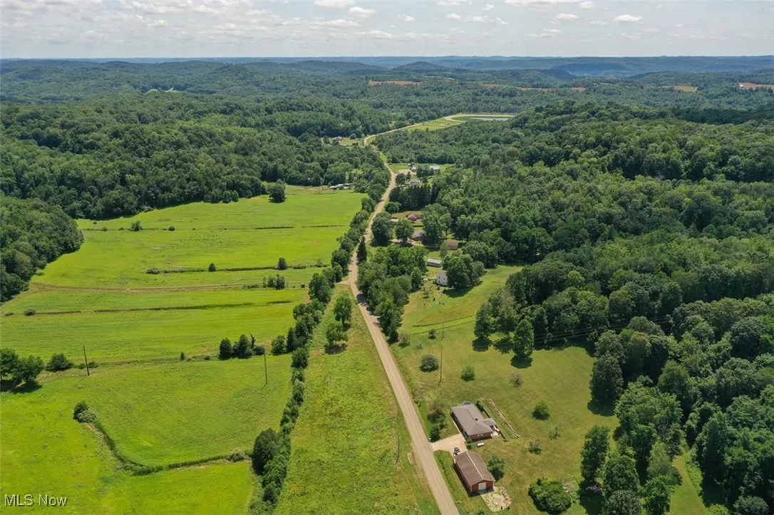 Overview of rural landscape with a heavily wooded area