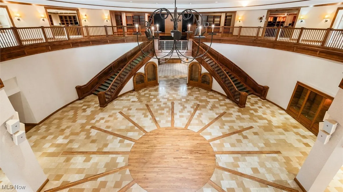 Stairs with inlaid floor details and baseboards