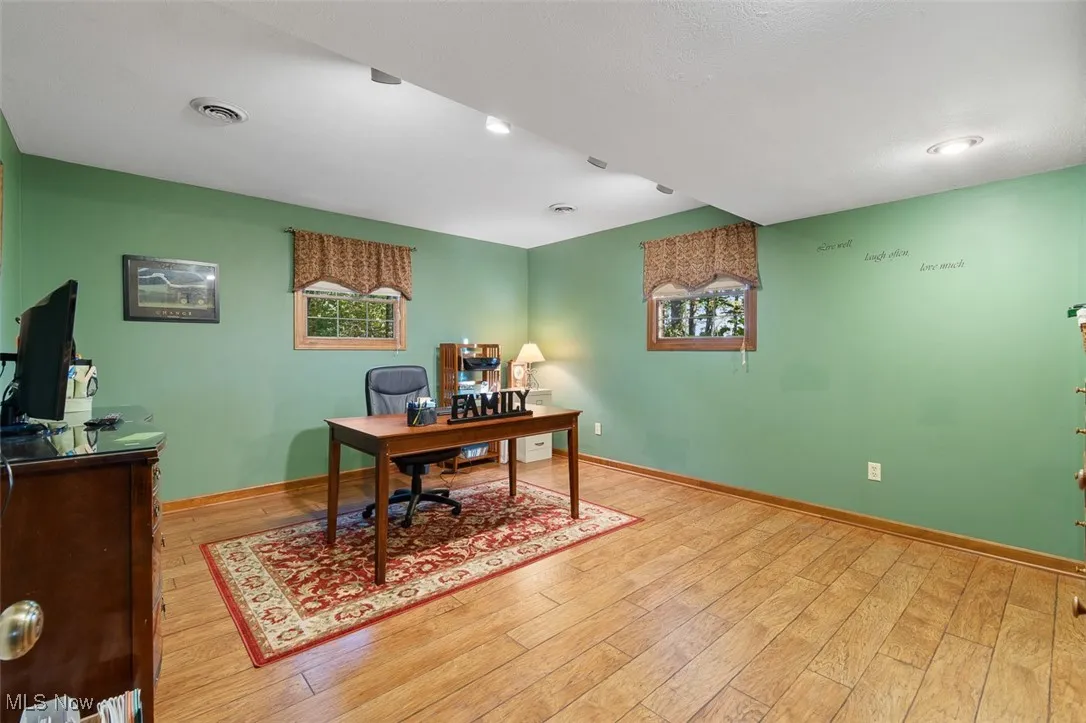 Bedroom featuring light wood-style flooring and recessed lighting