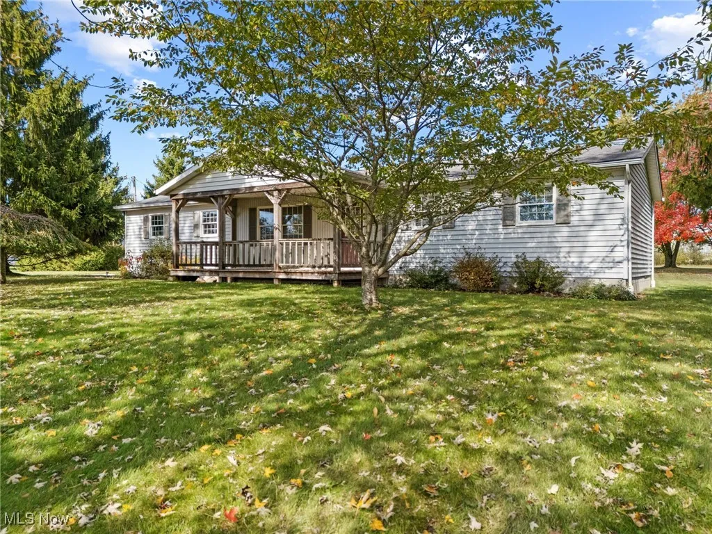 View of front of house with a front lawn