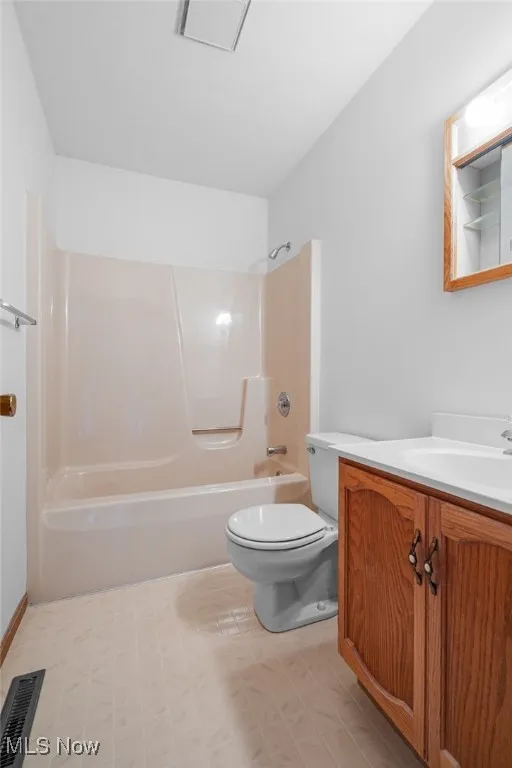 Full bathroom with vanity and shower / bathtub combination