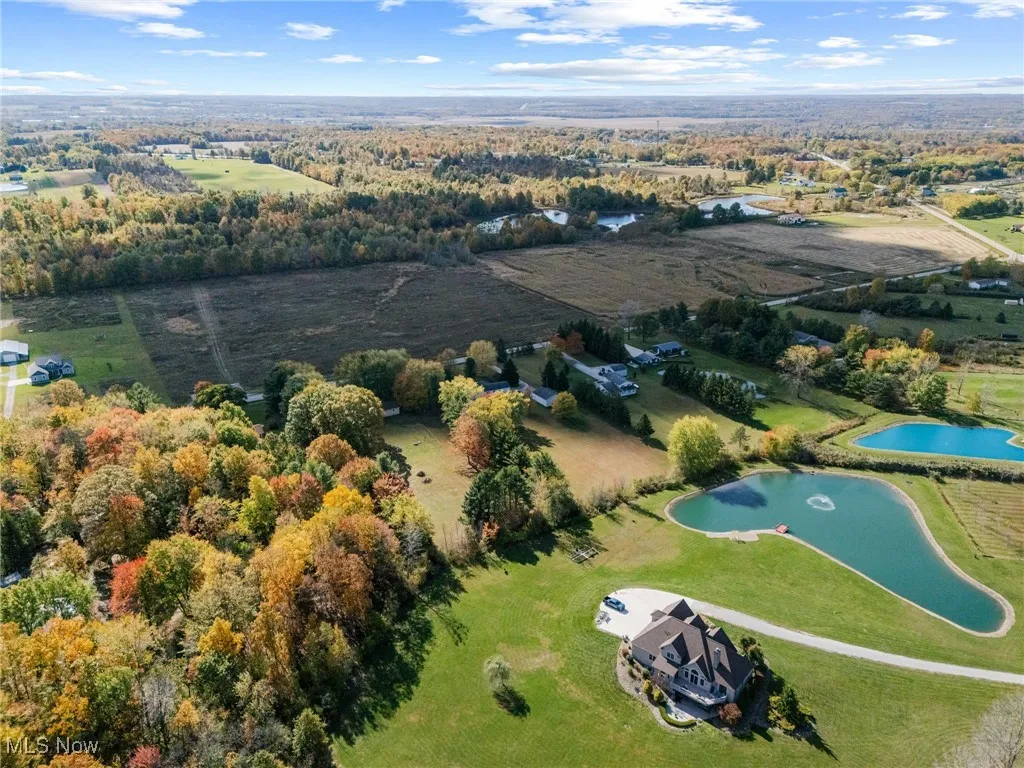 View of property location with a large body of water